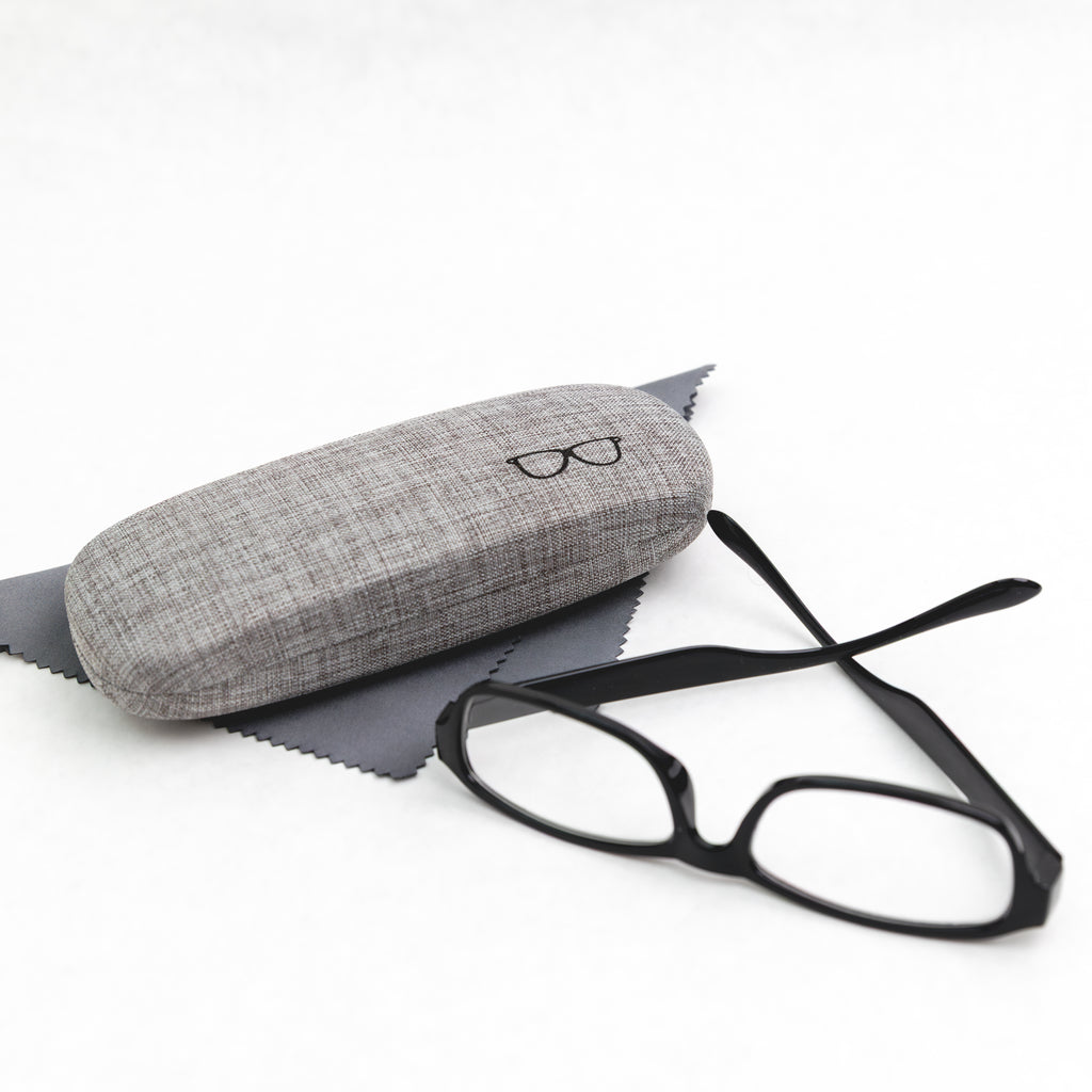 Black eyeglasses with a gray case on a white background
