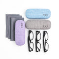 Set of eyeglasses with three cases and two cloths on a white background